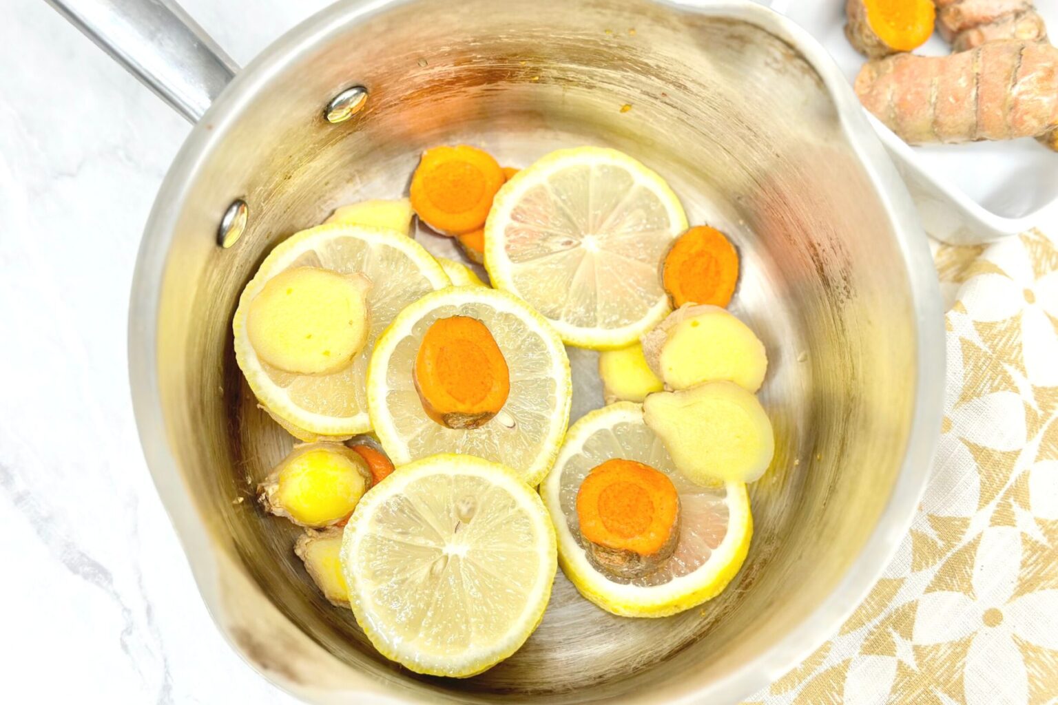 The Best Fresh Turmeric Ginger and Lemon Tea Recipe Daily Tea Time
